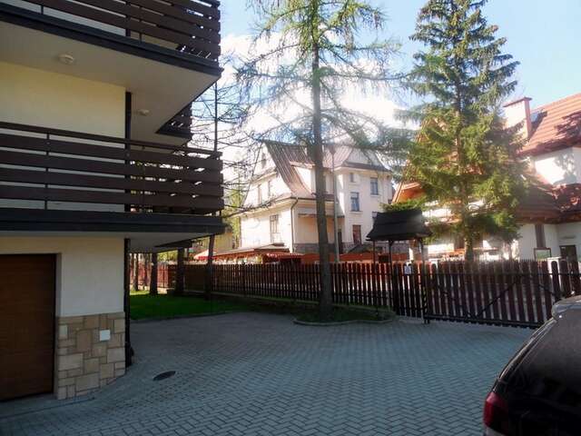 Апартаменты Apartament Familijny Tatrzański Закопане-19